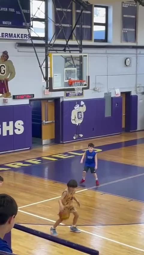A kid getting their game tracked play-by-play on the KidGOAT app